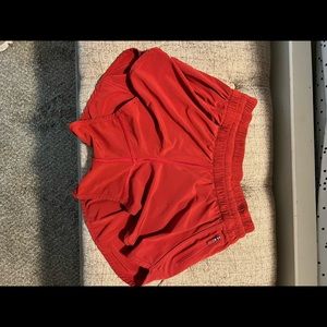 Lululemon red running shorts. Size 8